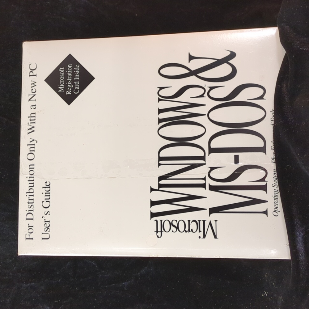 Microsoft windows and ms dos. Book